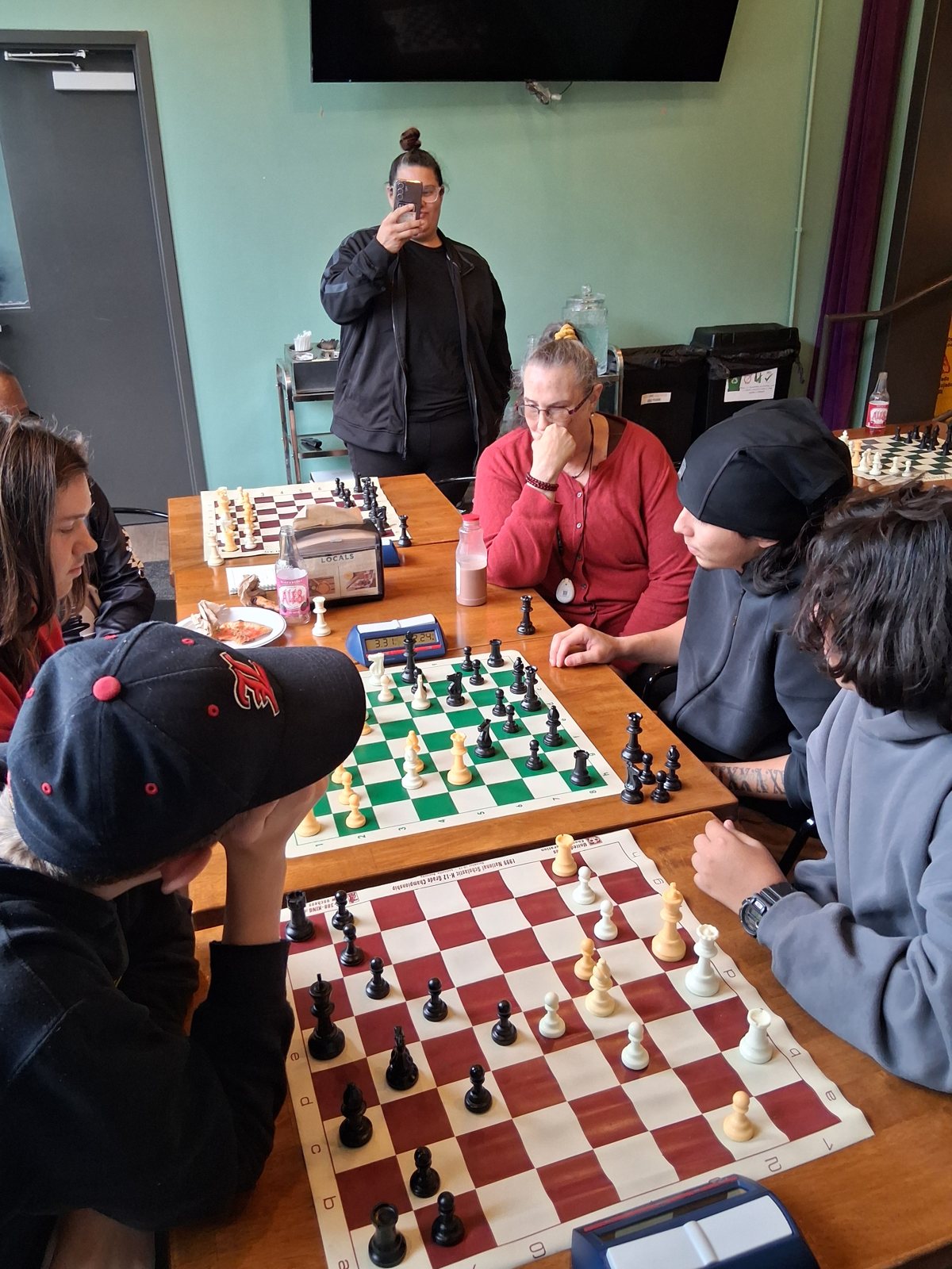 Boards, clocks and full concentration, youth chess tournament at Locals in Louisville