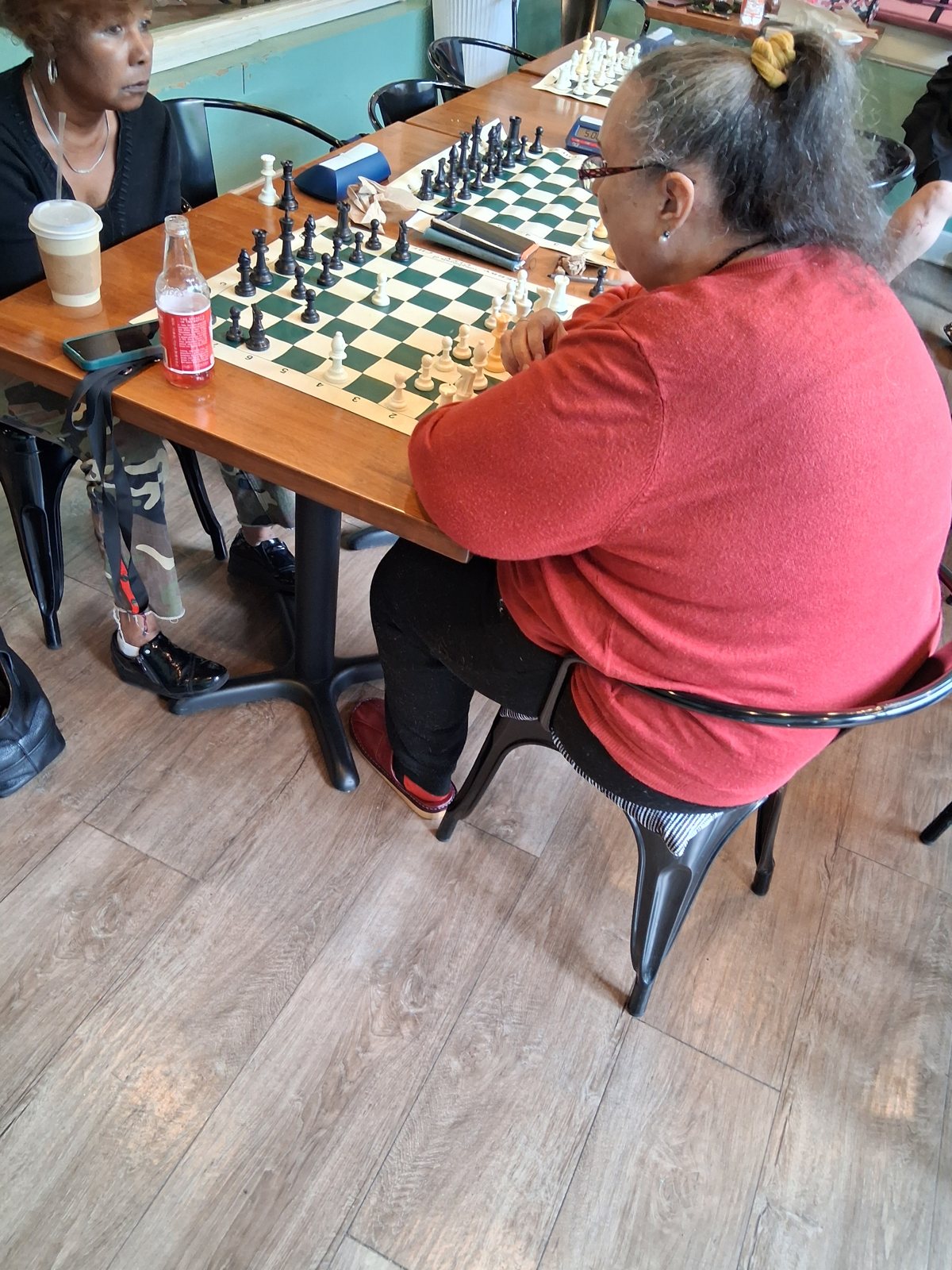 Players settled in for the long game, youth chess tournament at Locals in Louisville
