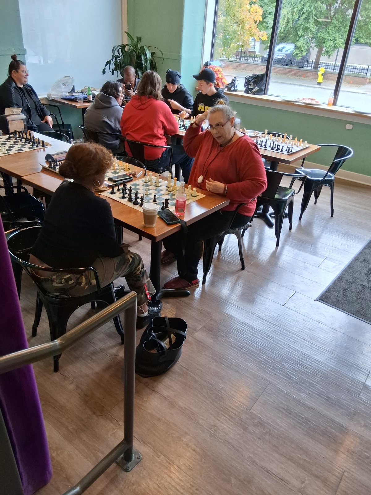 The whole room at Locals playing chess, youth chess tournament at Locals in Louisville